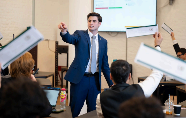 A committee chair directing debate