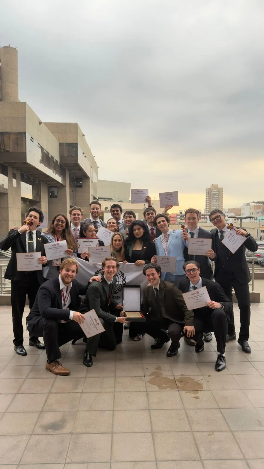 The HultMUN delegation with its Harvard WorldMUN award in Lima, Peru